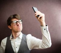 Angry man with mobile smartphone