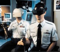 Third Place Illustrative

ÒVR4Ó by Master Sgt. Fernando Serna, U.S. Air Force.

Tech. Sgt. William Lexa (left) and Senior Airman Raymond Pettit conduct virtual reality research at Brooks Air Force Base, Texas, on pilot/cockpit systems to help make their training more realistic.